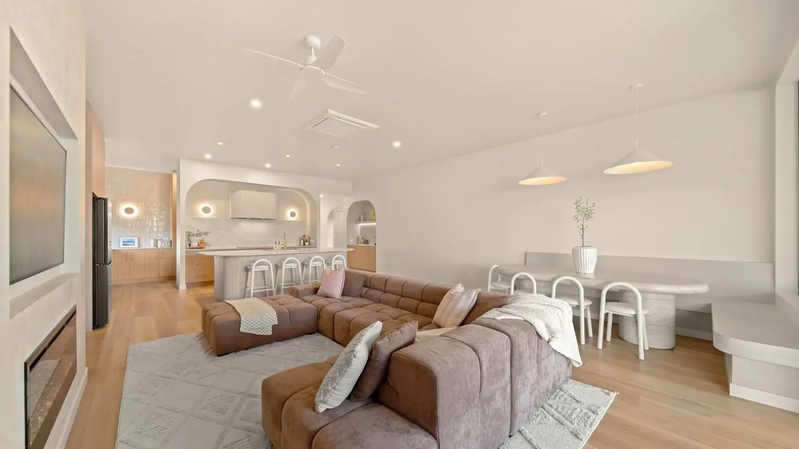 Living and dining opening to the outdoor entertaining area at Sunnymount House
