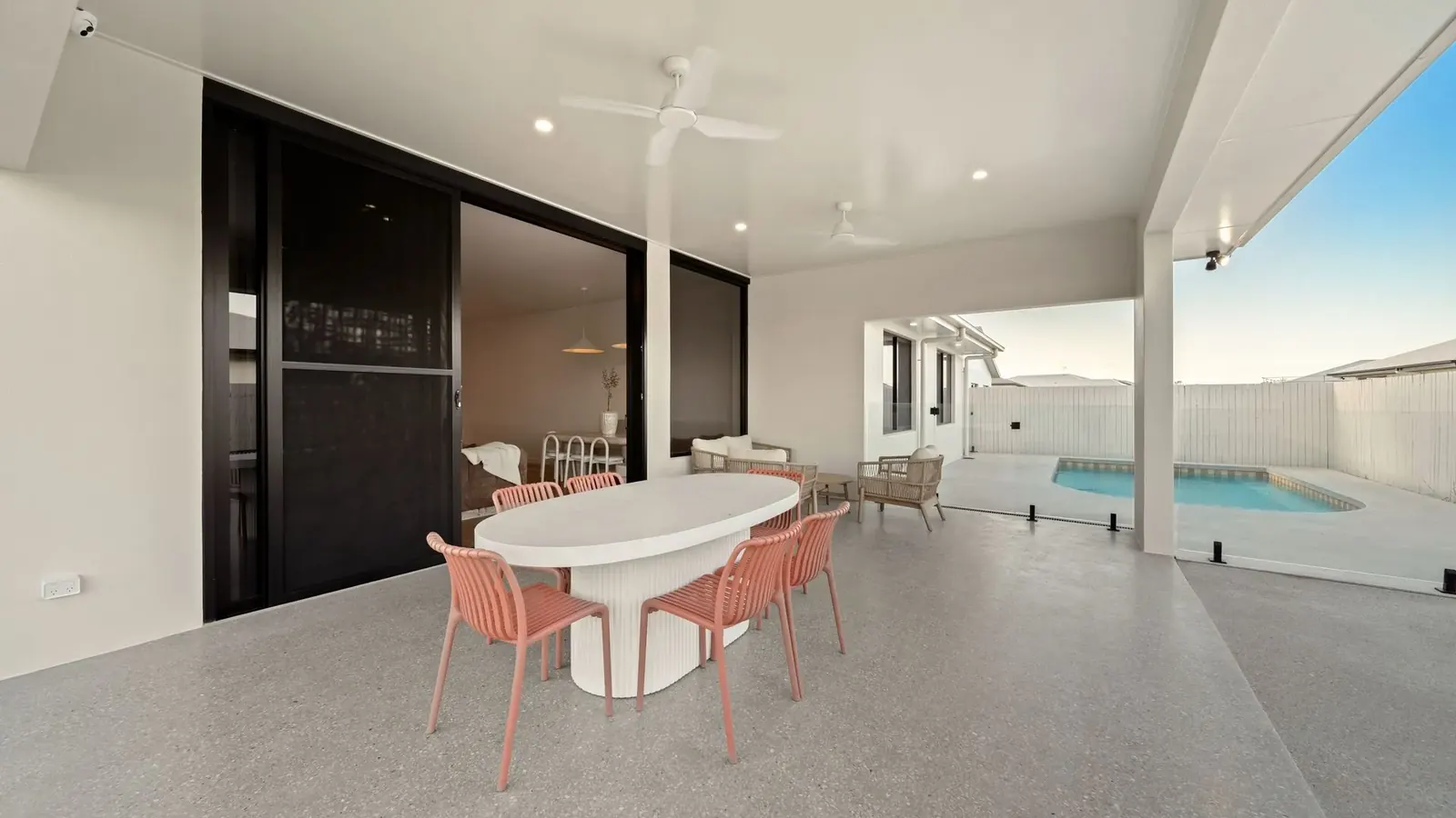 Living and dining opening to the outdoor entertaining area at Sunnymount House
